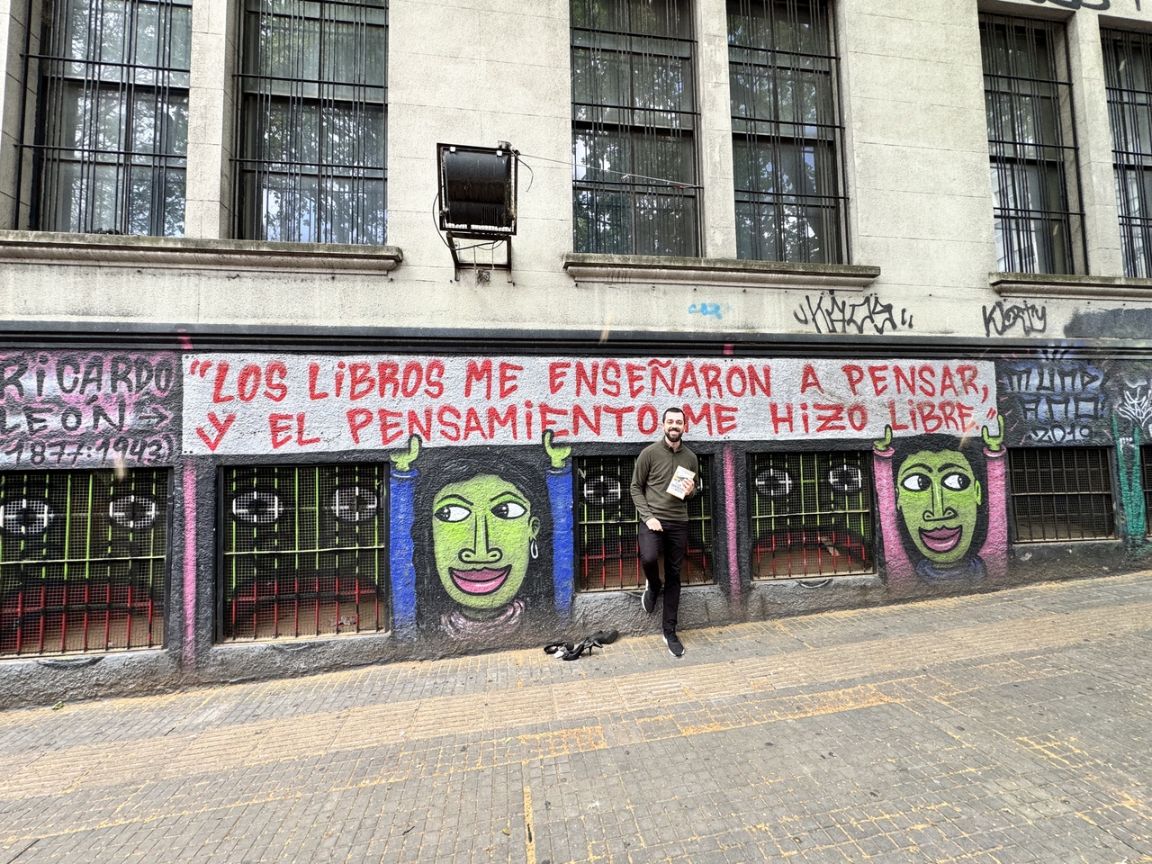 Me in Montevideo in October 2024, holding La Sociedad de la Nieve by Pablo Vierci